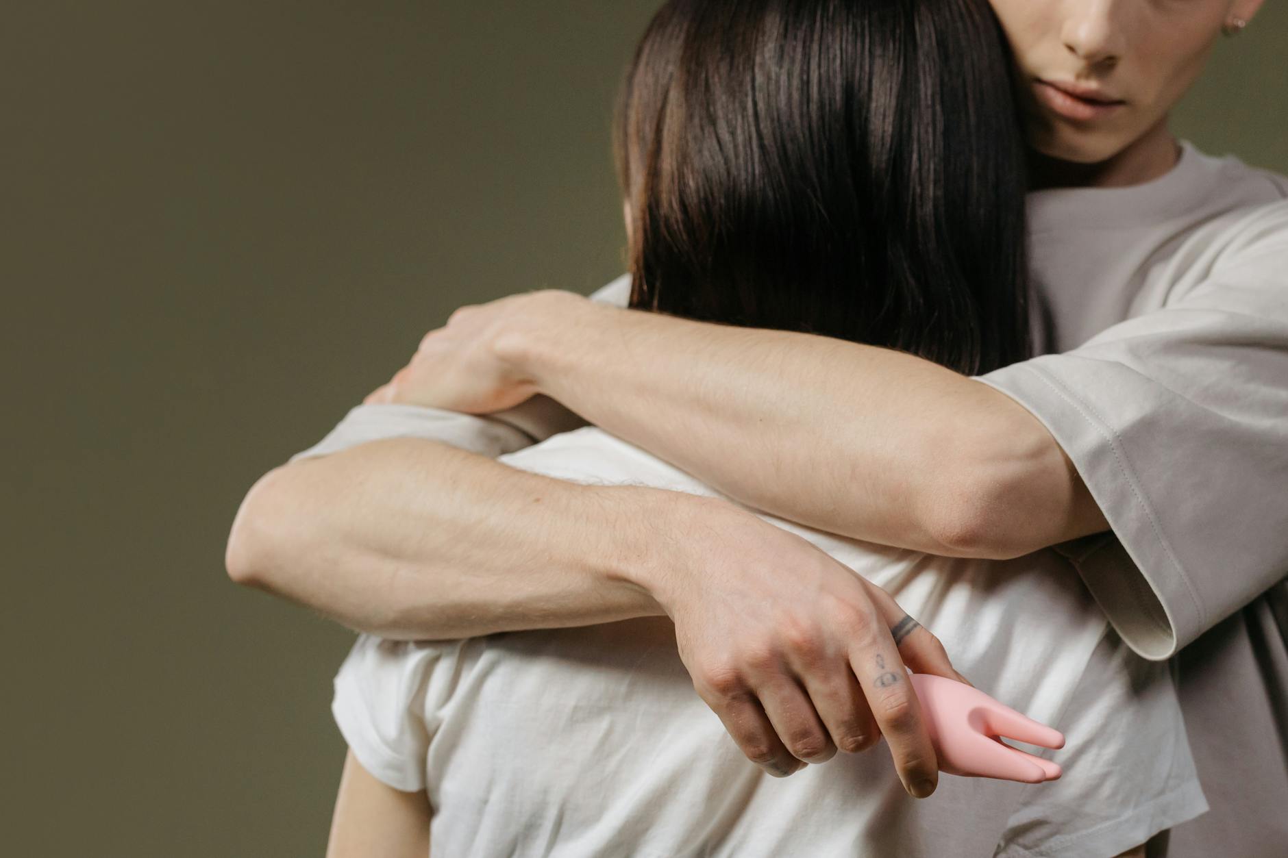 Close-up of a couple embracing, highlighting intimacy and connection during midlife.